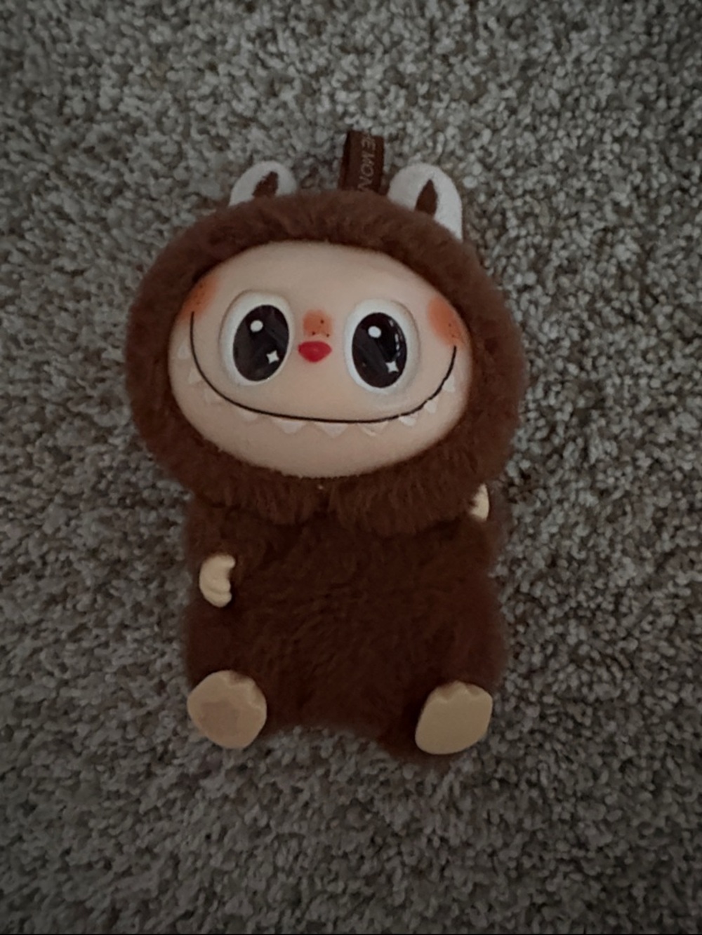 Pop Mart THE MONSTERS (labubu) have a seat. Brown.